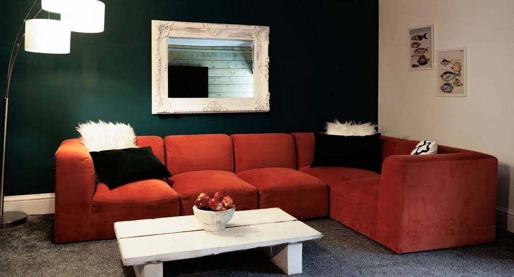 Large lounge at Autumn Cottage Bristol with corner sofa