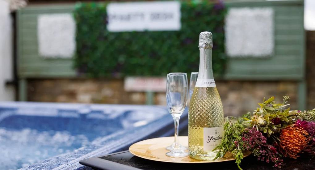 Drinks by the hot tun at Autumn Cottage Bristol