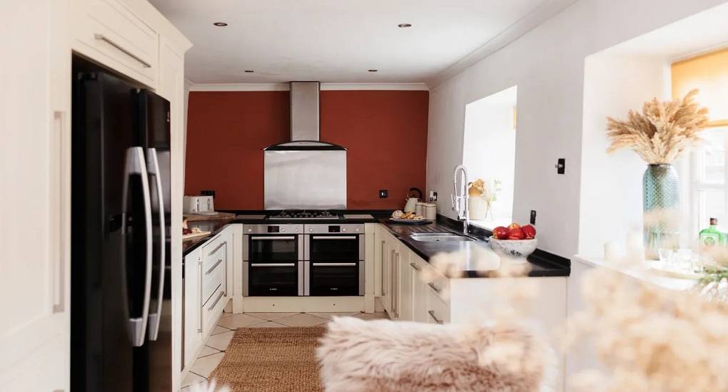 Long view of the kitchen at Autumn Cottage Bristol perfect for a private chef