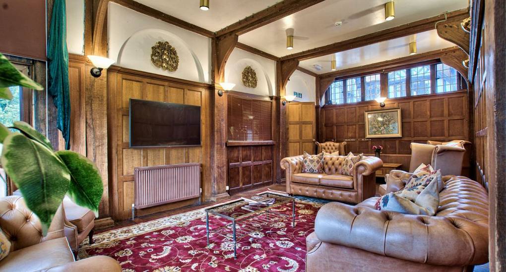 TV room with leather sofas