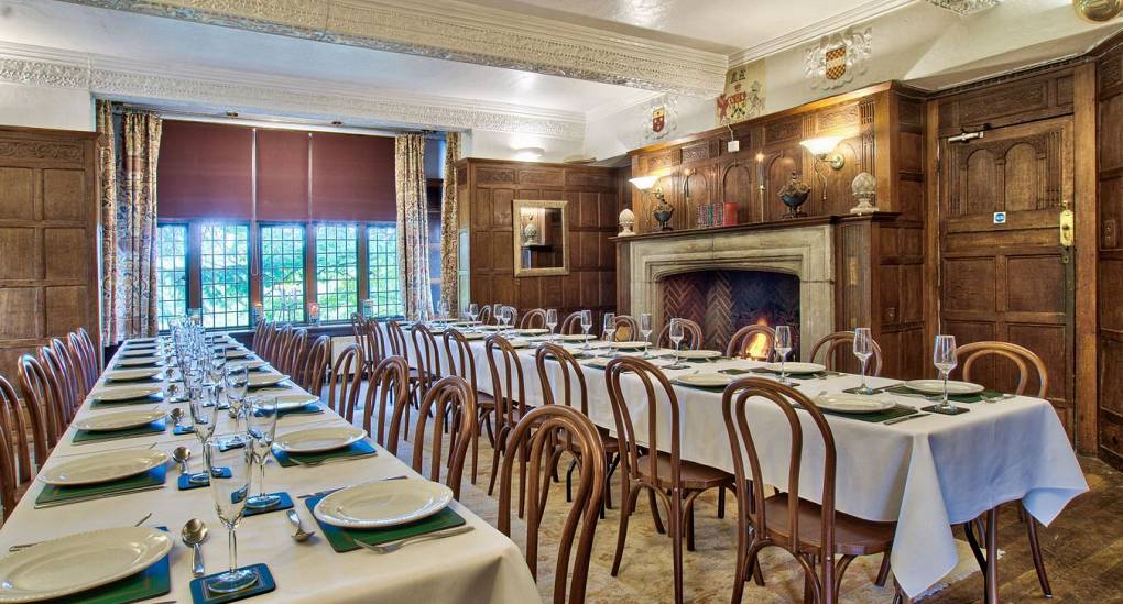 Long view of dining room and 2 tables 