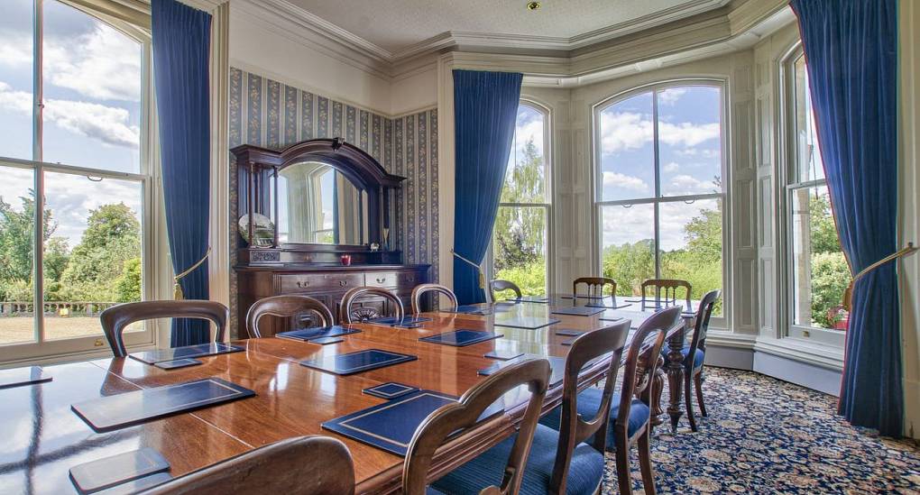 Dining table with bay window view