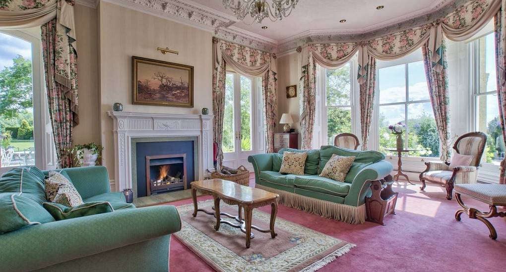 Large bay window in Lounge with open fire