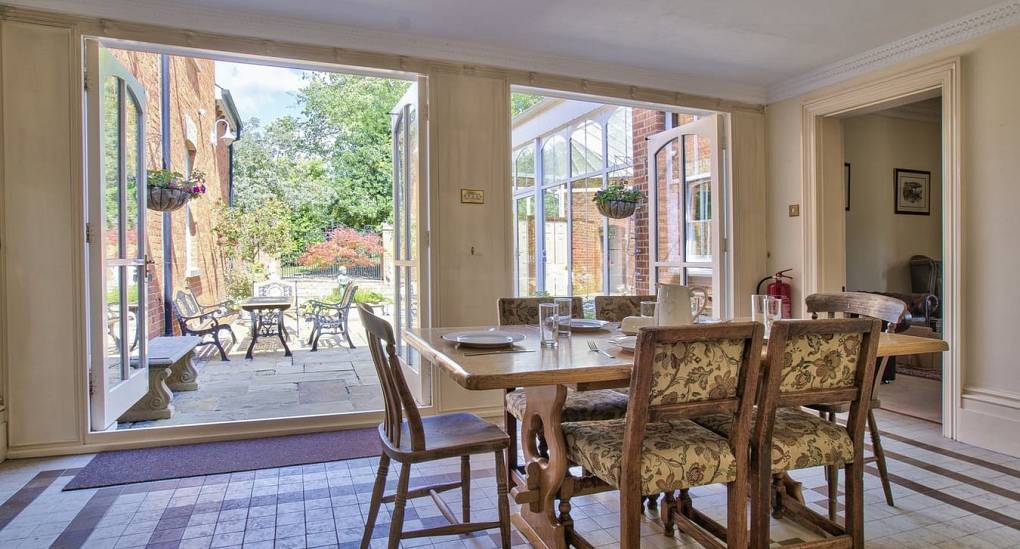 Smaller dining table with patio doors open