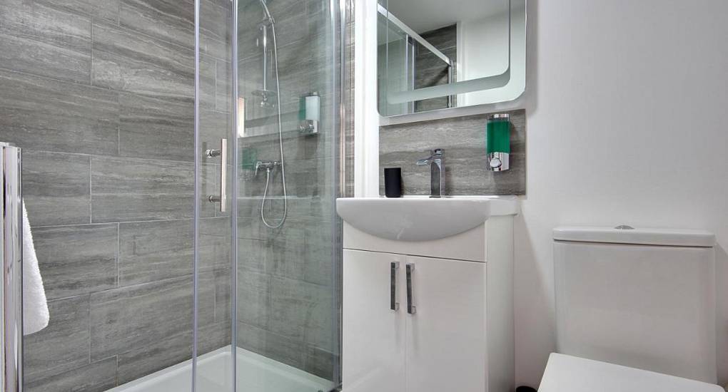 Bathroom with shower sink and toilet