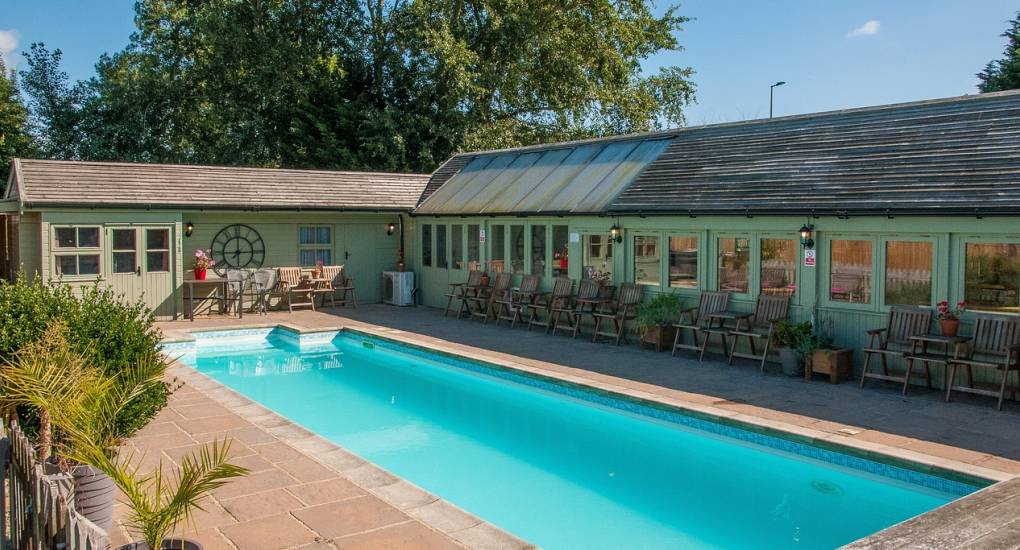 View of the heated swimming pool at the Villa Bristol party house