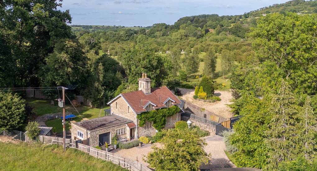 Aerial view of Summerset House: A luxury hen party house near Bath sleeping 24 guests with extensive gardens and private cabins.