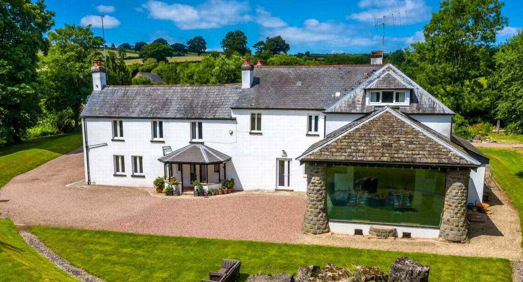 Angled view of the outside of the luxury Wales hen do party house the Musicians Manor
