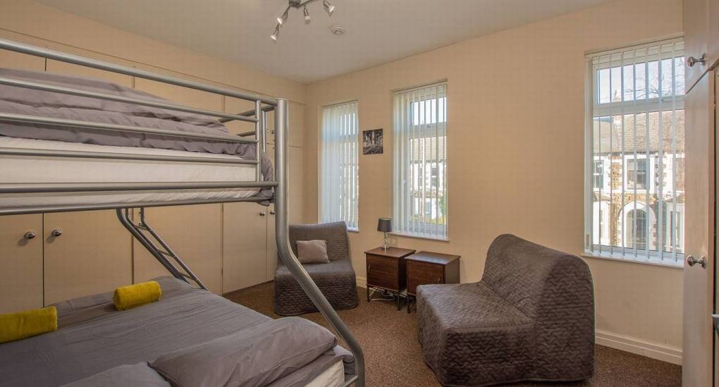 Bedroom at the Number 4 Cardiff party house with double bunk bed and furniture