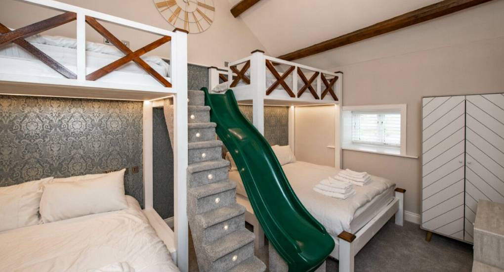 Fitted bunk beds with a slide to get down