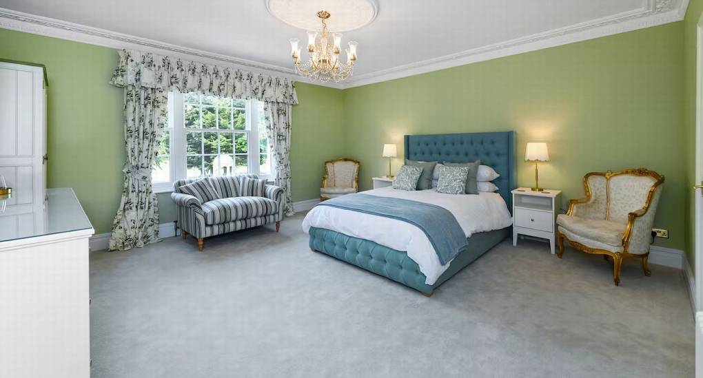 Stunning Bedroom 1 at The Parsonage featuring a king bed and en-suite access for hen groups near Nottingham.