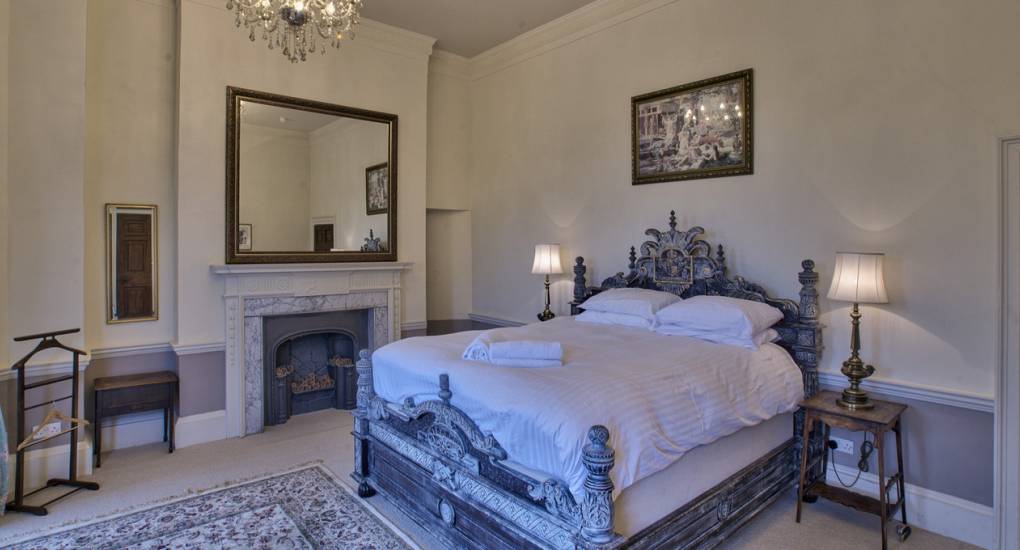 One of the eleven bedrooms at the Country Fortress Newcastle party house