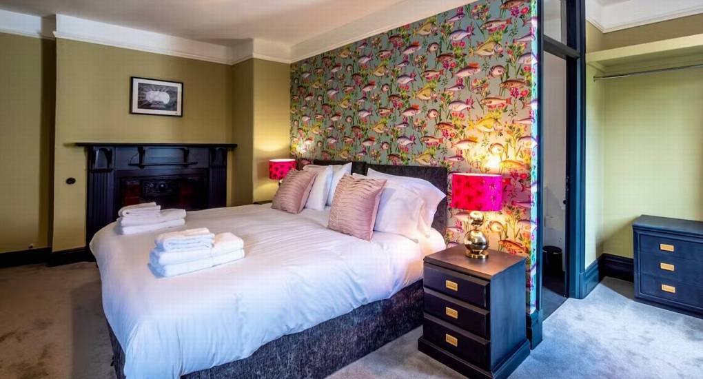 Bedroom with ensuite facilities at the luxury Wales hen party house the Musicians Manor
