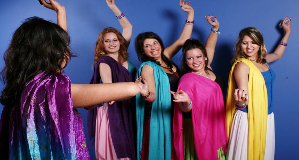 Group of hens learning Bollywood dancing