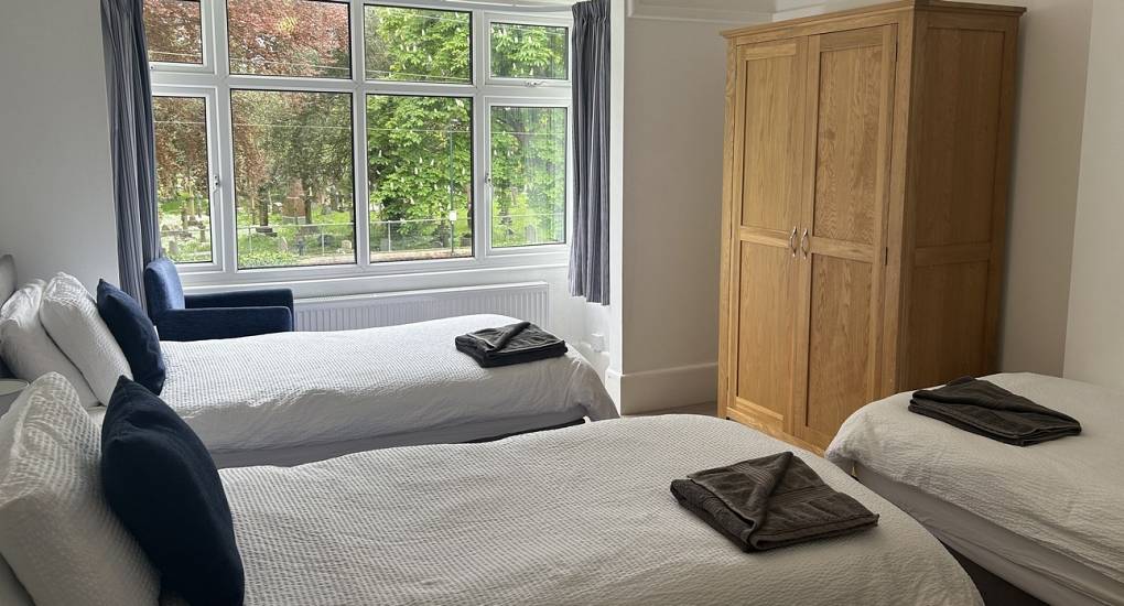 One of the bedrooms in the Charming Bournemouth Party House