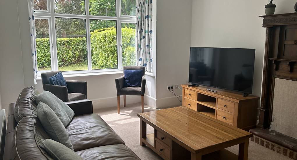 Reverse angle of the lounge area in the Charming Bournemouth Party House