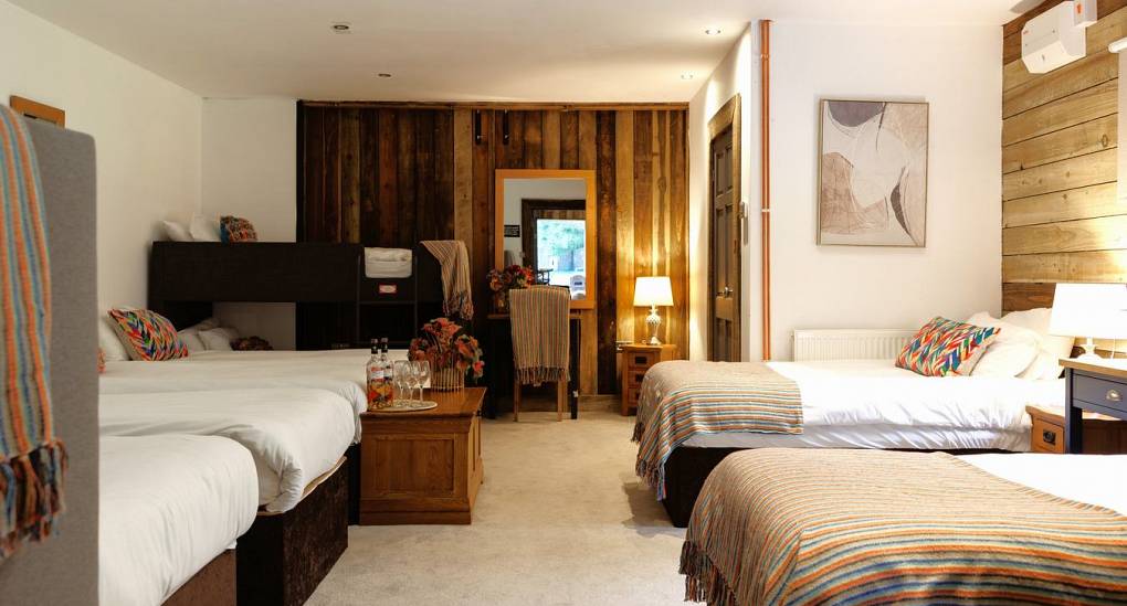 Bedroom with wooden feature walls