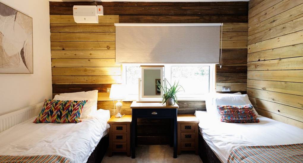 Twin rooms with wooden walls