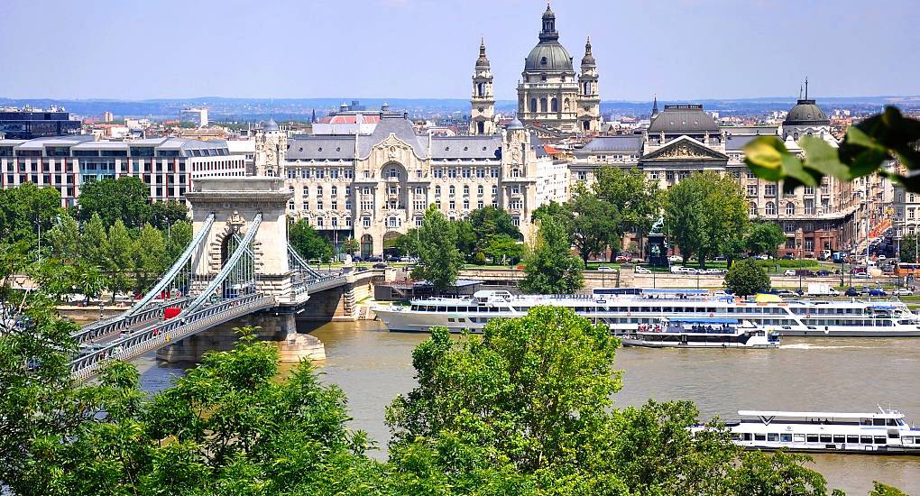 Széchenyi Chain Bridge across Danube River with St. Stephen's Basilica in the background for a Budapest hen do.