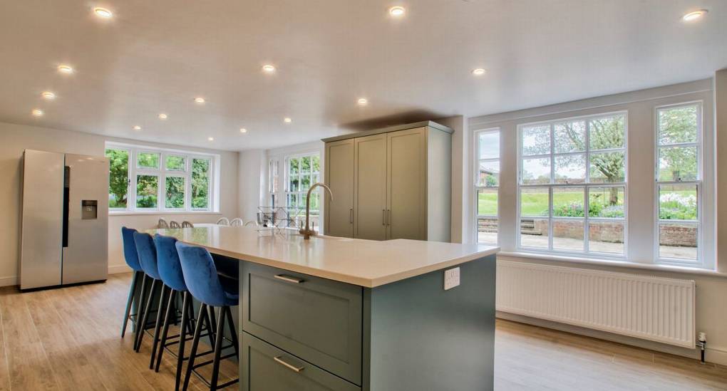 Breakfast bar in kitchen with spot lights