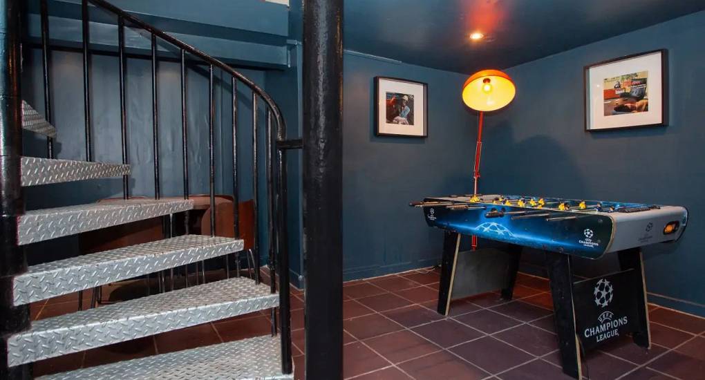 A view from the bottom of the stairs with the Table Football Table