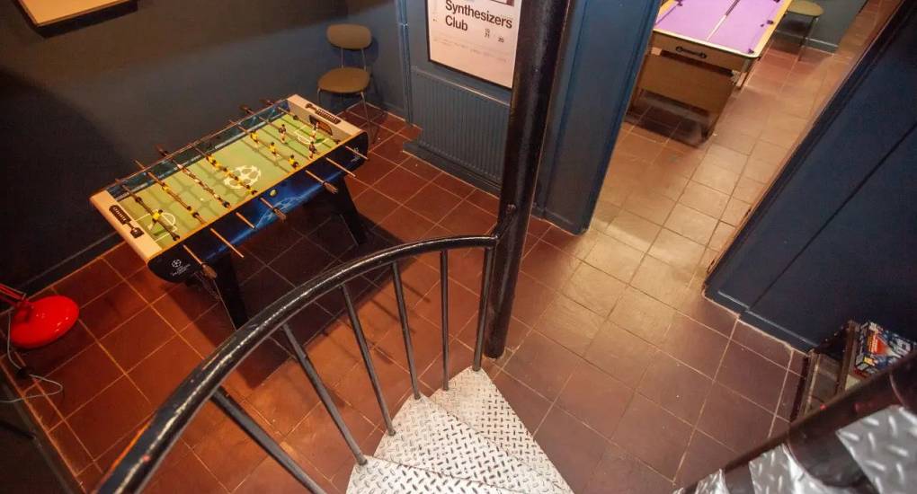 A view from the top of the spiral staircase overlooking the Table Football Table