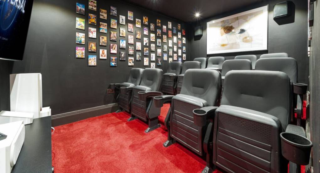 Cinema room at the Morecombe stag and hen accommodation taken from the screen looking at the tiered seating