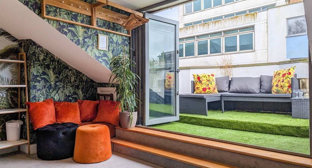colour-house-bedroom-looking-out-to-terrace.jpg