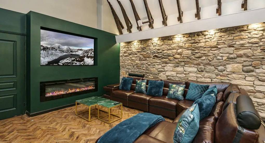 Cassette style fireplace, tv and sofa in the Grand Halls open plan space