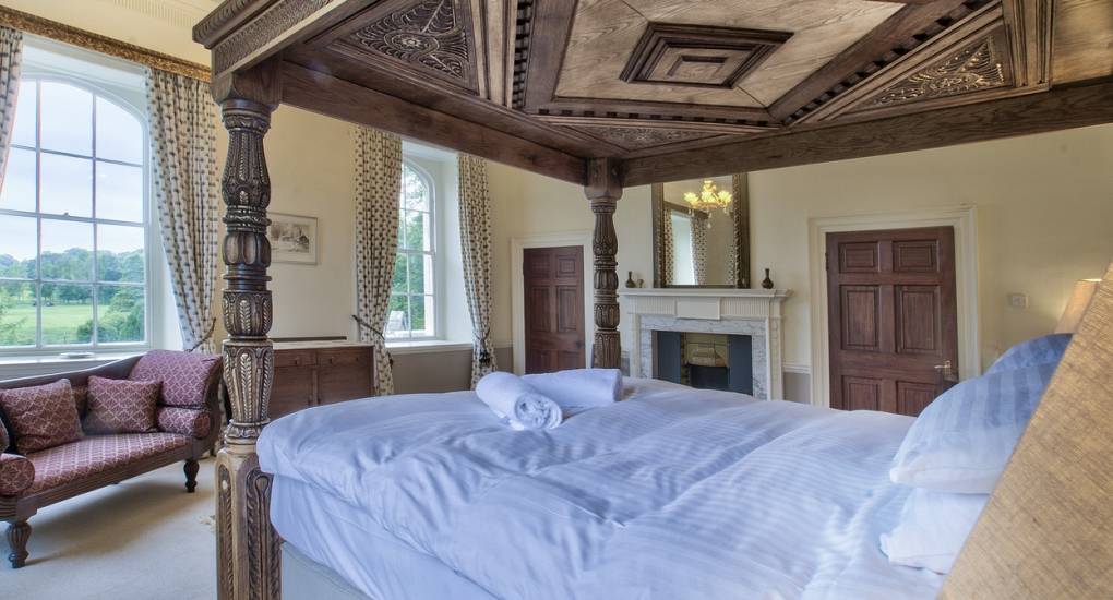 One of the eleven spacious bedrooms at Country Fortress, a luxury Newcastle hen party house designed for large group stays of up to 32 guests.