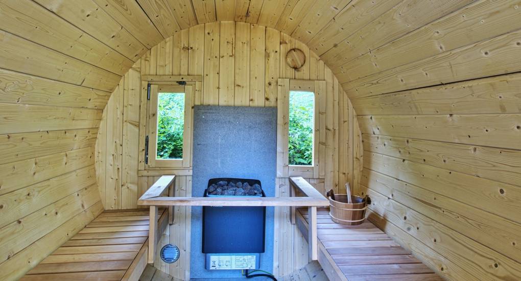 The private wooden sauna interior at Country Fortress, a luxury feature for a relaxing Newcastle hen weekend.