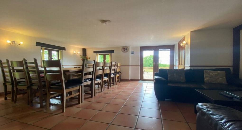 open plan dining area with tiled floor