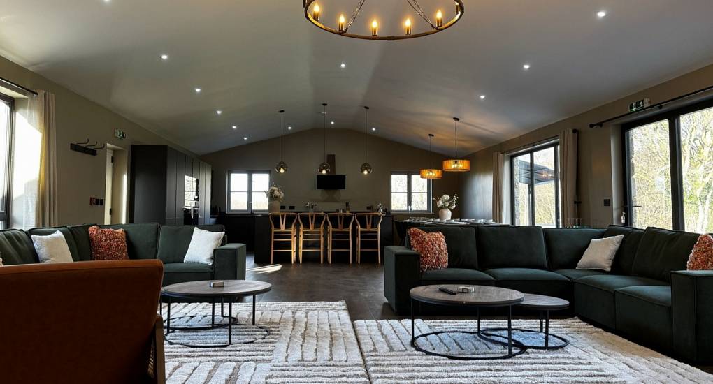 Large open-plan lounge and kitchen at Geordie Getaway 26, a spacious Newcastle party house perfect for hen group socialising.