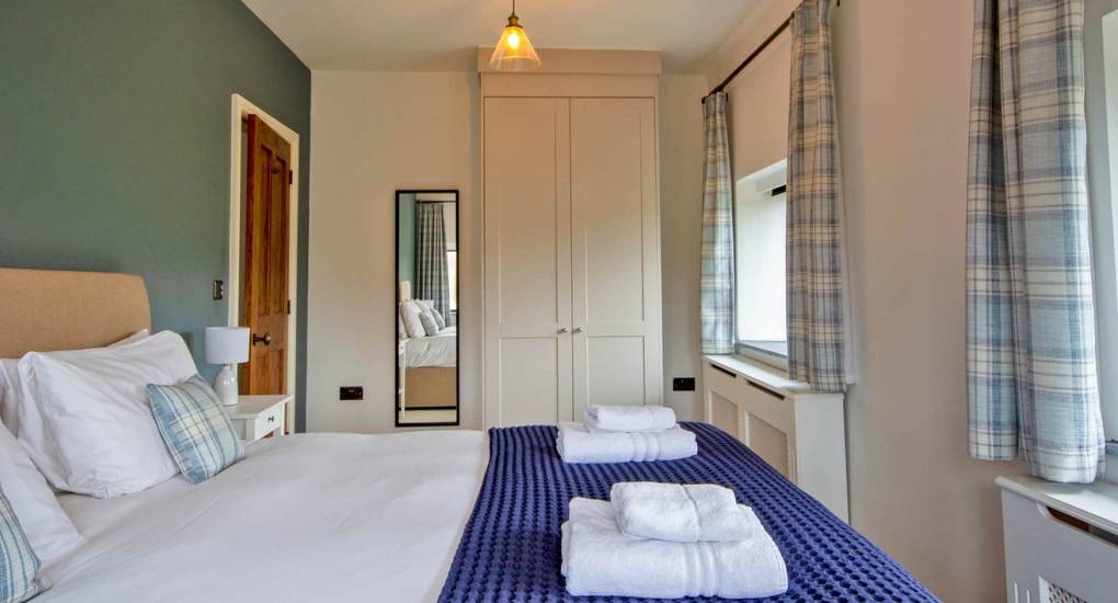 Modern double bedroom at Godfrey Manor, a luxury hen party venue located in the heart of the Peak District.