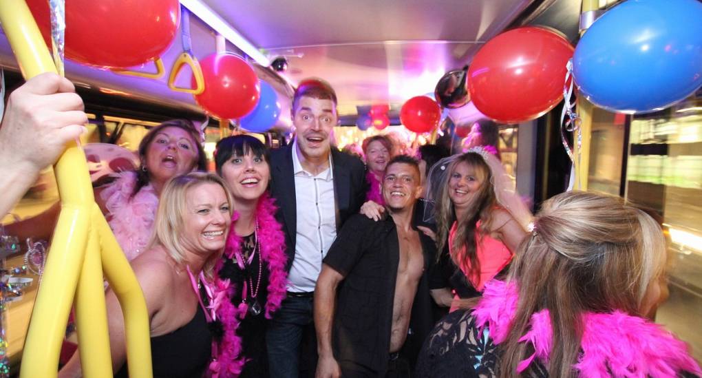 Group of hens enjoying the party bus