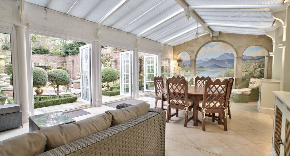 Conservatory with sofa and coffee table