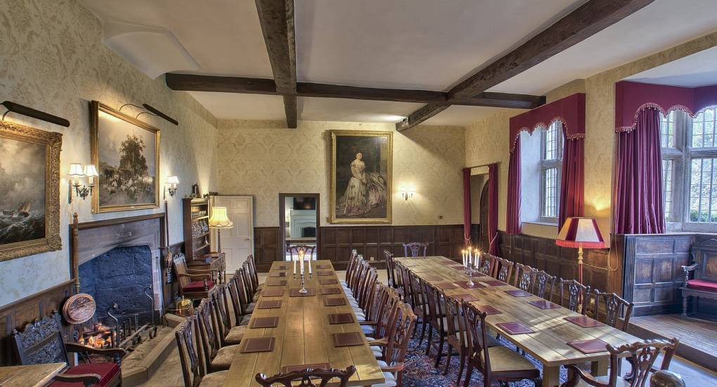 Big dining room with wooden beam ceiling 