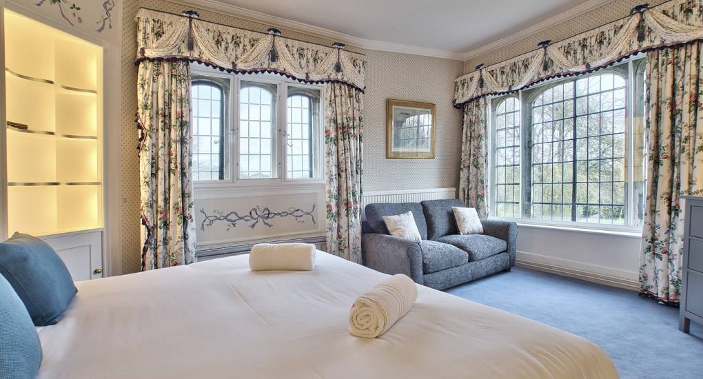 Double bed and sofa bed in bedroom