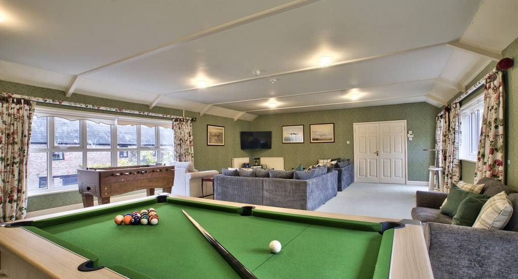 Massive games room with pool table