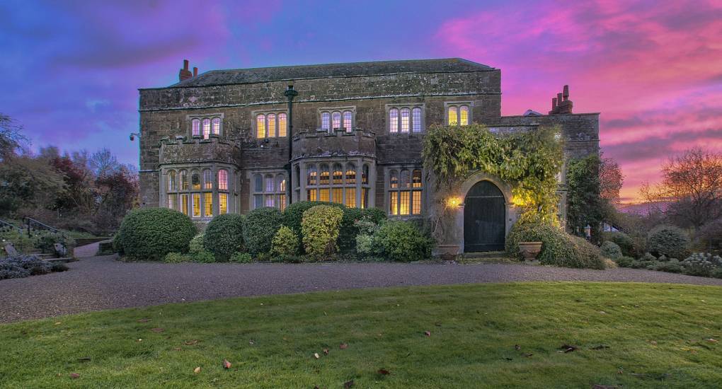 Sunset over the house with rainbow colors 