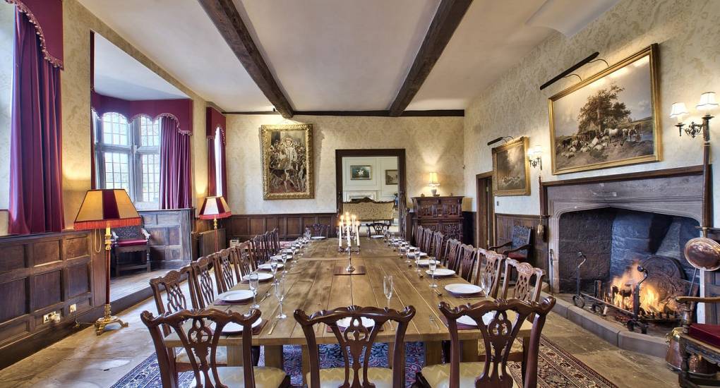 Fireplace in front of massive dining table