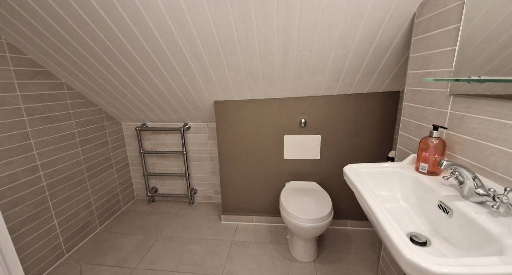 Main bathroom in upper apartment