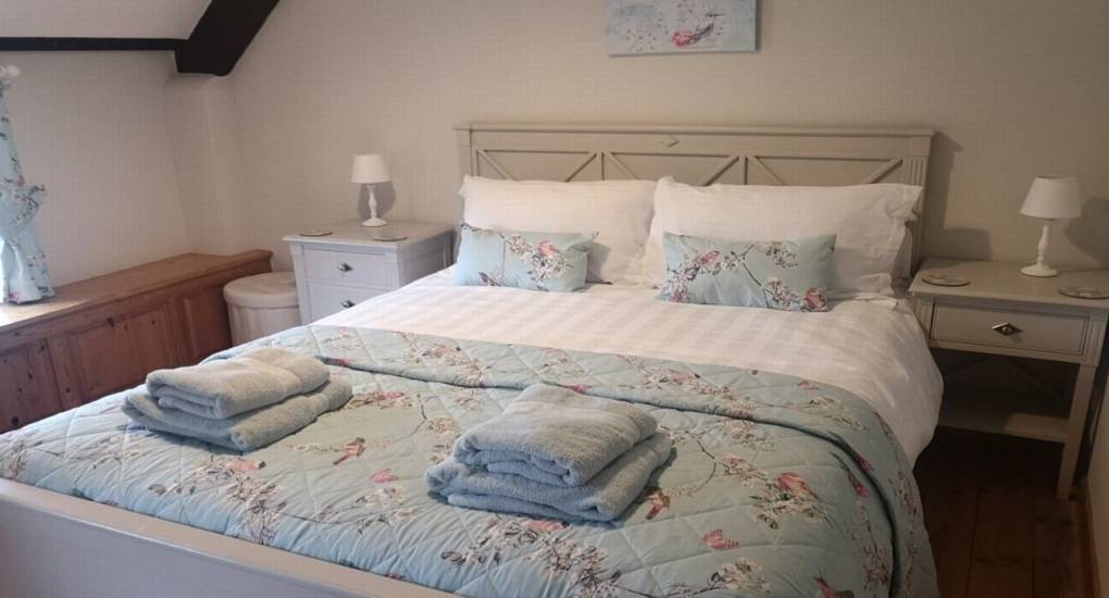 double bed with bedside tables