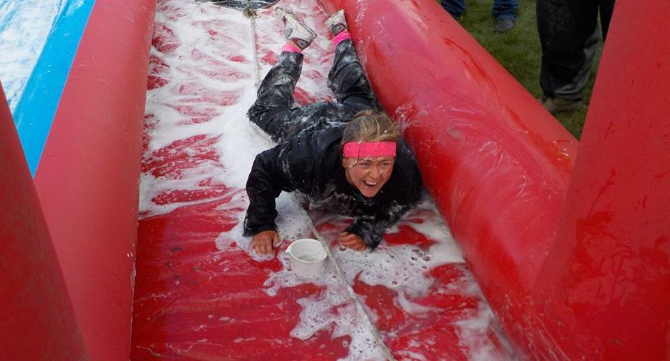 A happy, yet wet hen enjoying the Inflatable Games