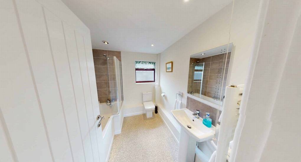 Family bathroom with bath