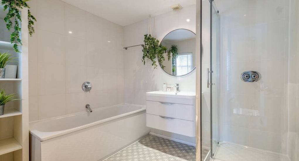 Large bathroom with bath and shower