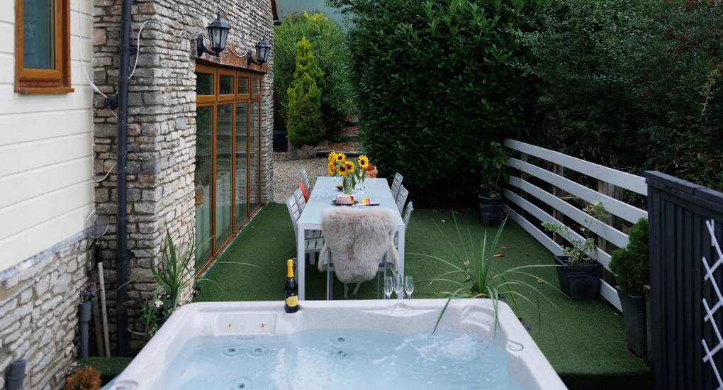 Hot tub and garden table and chairs