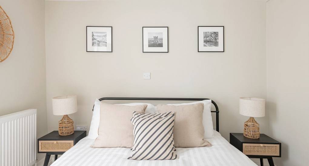 Double bedroom with wall art