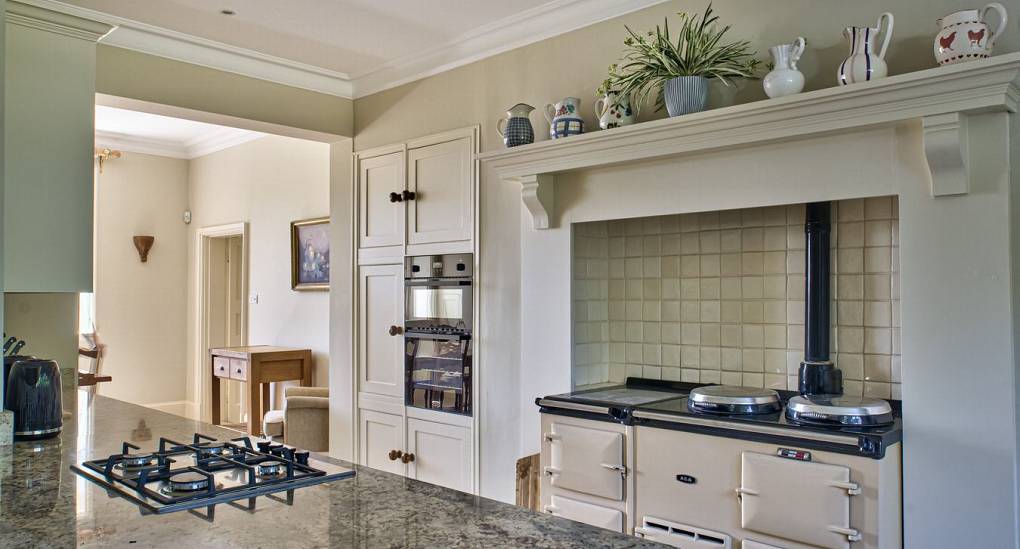 Gas hob and aga view of kitchen