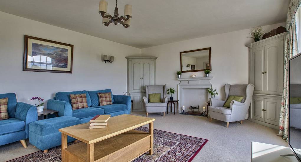 Lounge with large central rug